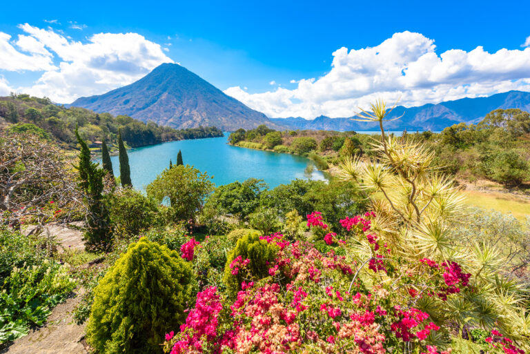 Beautiful bay of Lake Atitlan with view to Volcano San Pedro in highlands of Guatemala, Central America