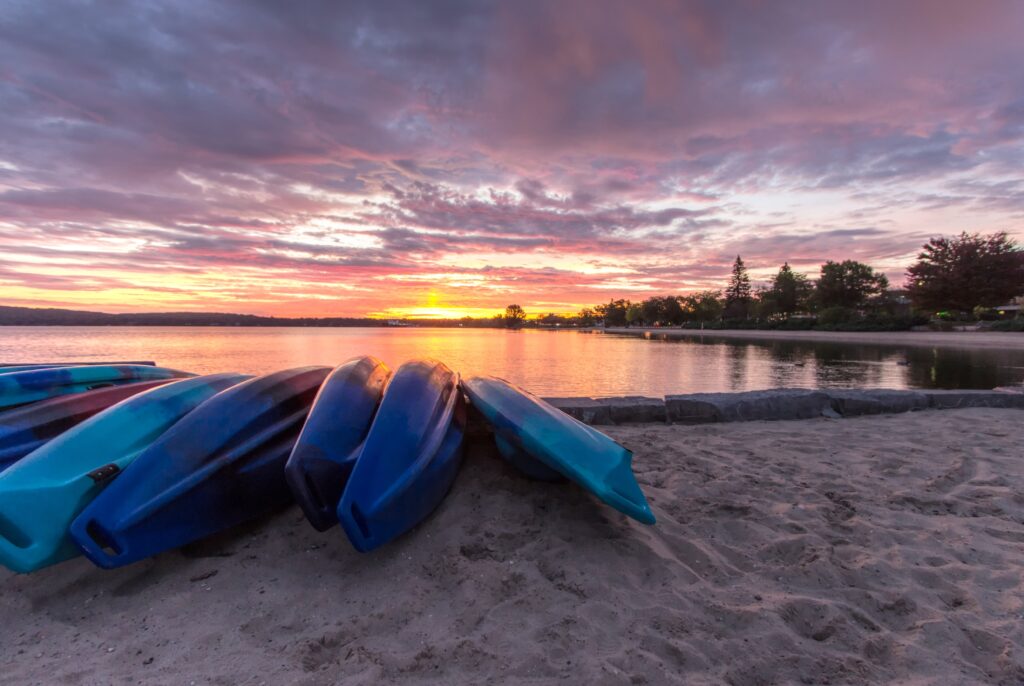 https://www.shutterstock.com/image-photo/summer-kayak-sunrise-row-colorful-kayaks-747950923