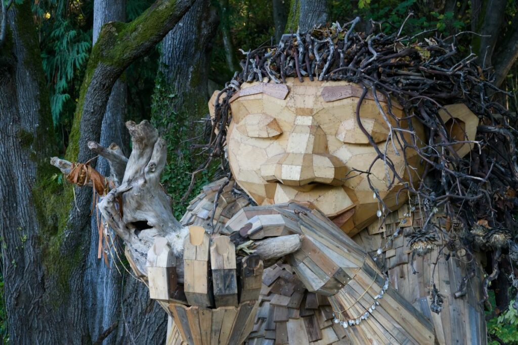 Seattle - October 26, 2023; Danish environmental artist Thomas Dambo artwork - Bruun Idun face view with instrument